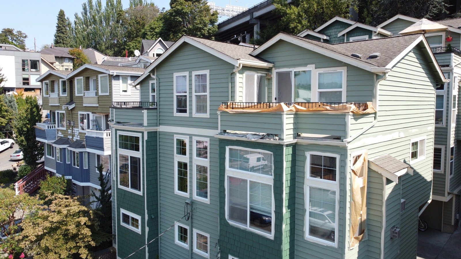 Exterior Painting in Green Colors of Multifamily Homes in Seattle, WA